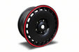 A black multi-spoke aftermarket car wheel rim with a thin red outer lip, 